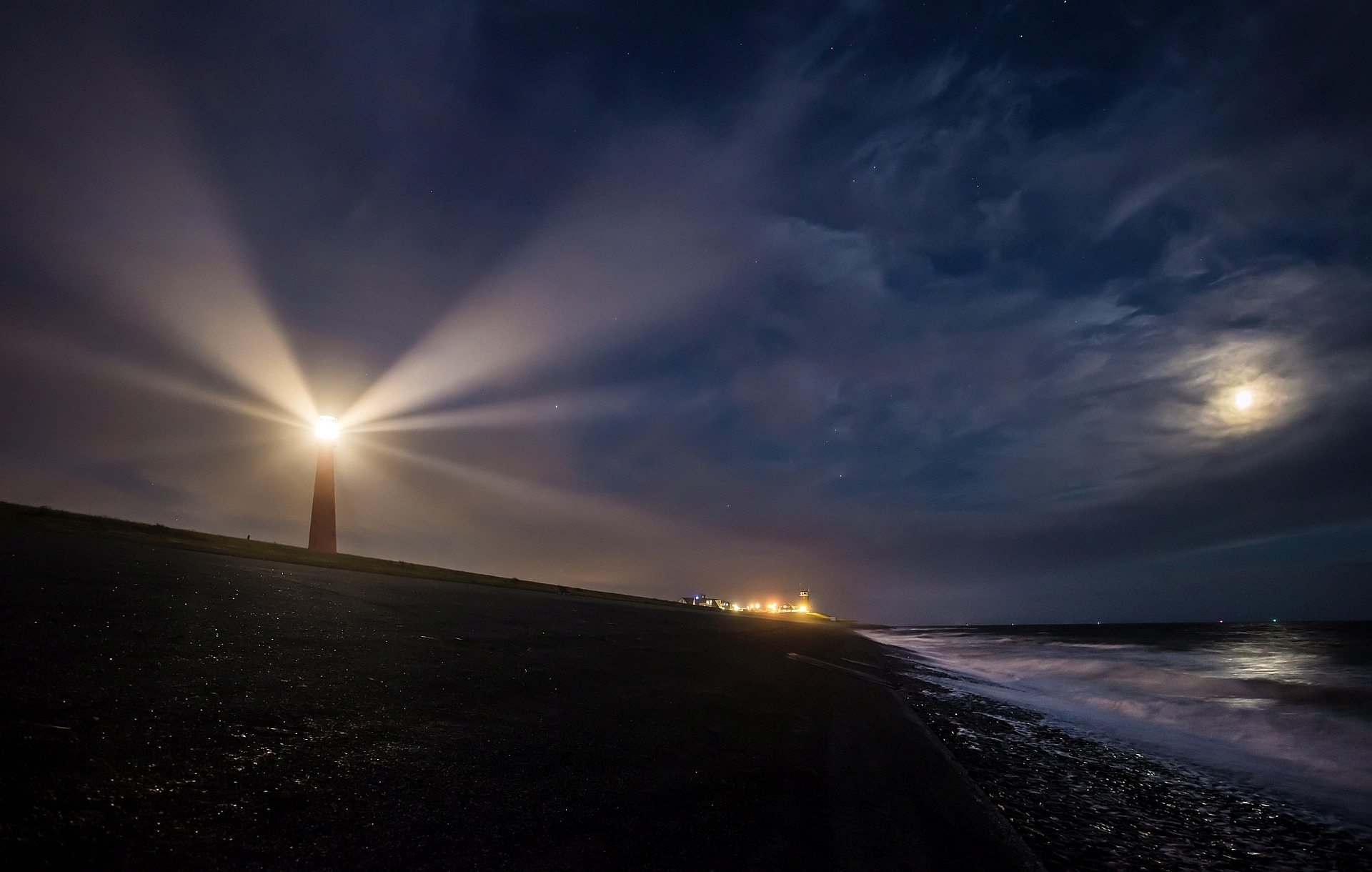 Help is in the Way: Lighthouse at night