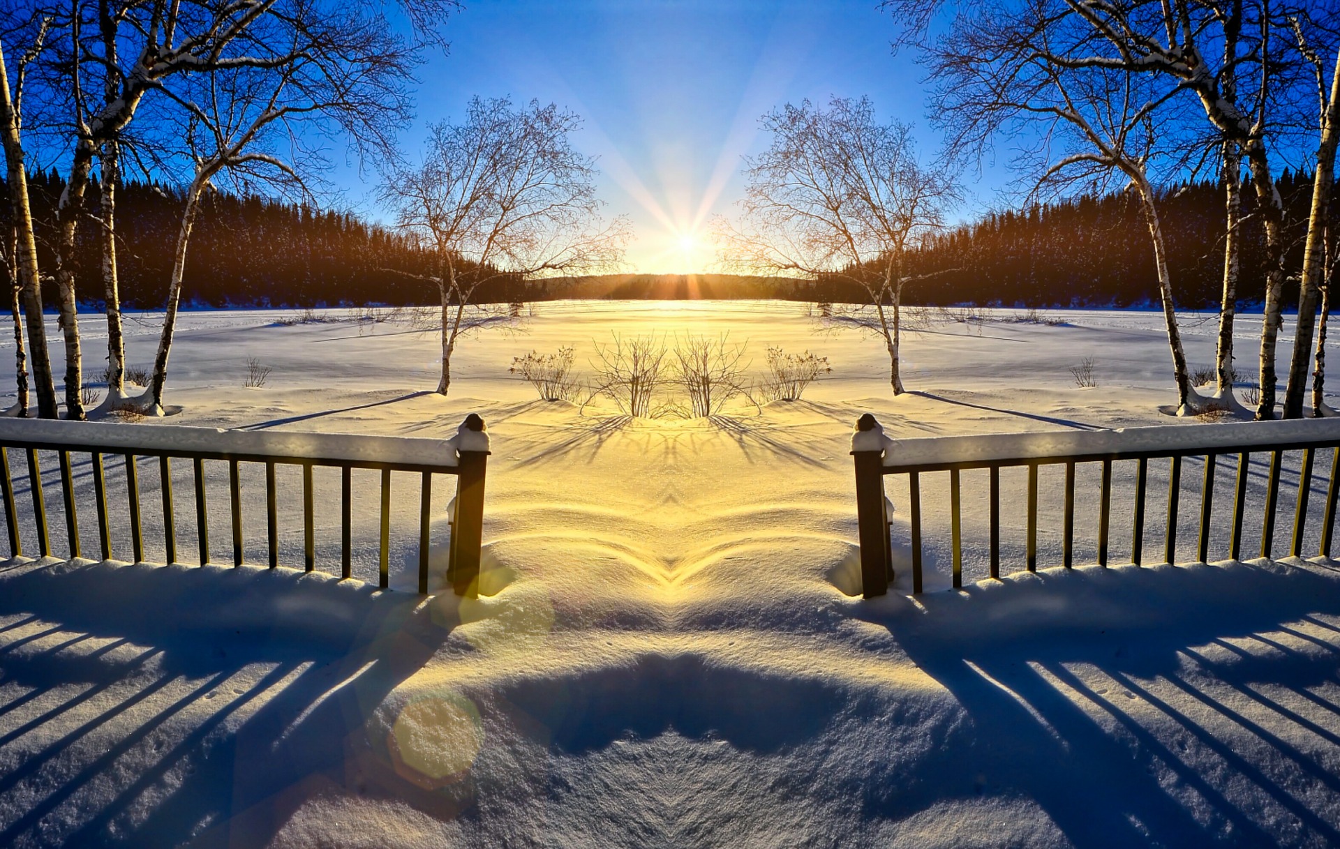 Sunlight over a snowy landscape.